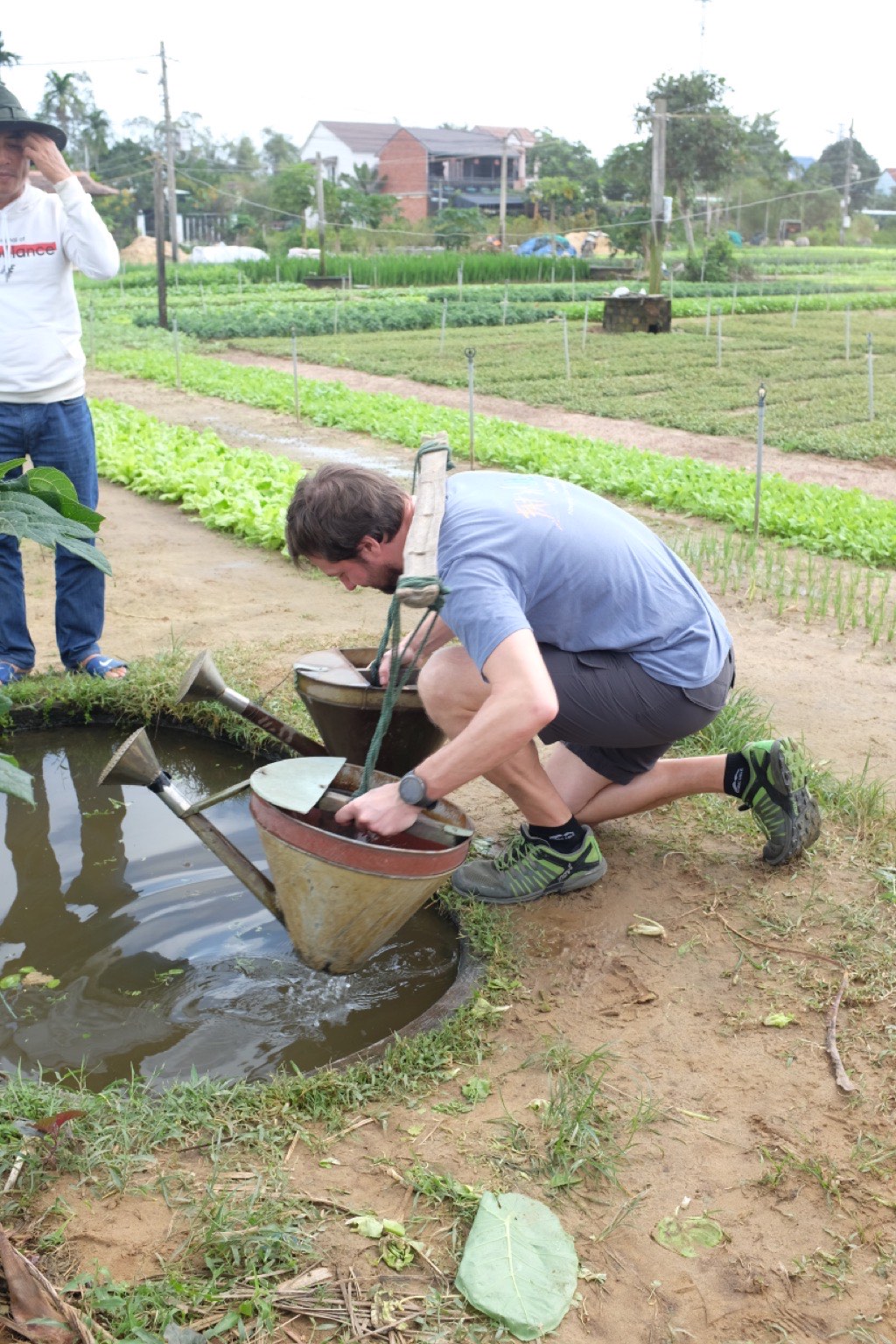 Austen filling watering cans