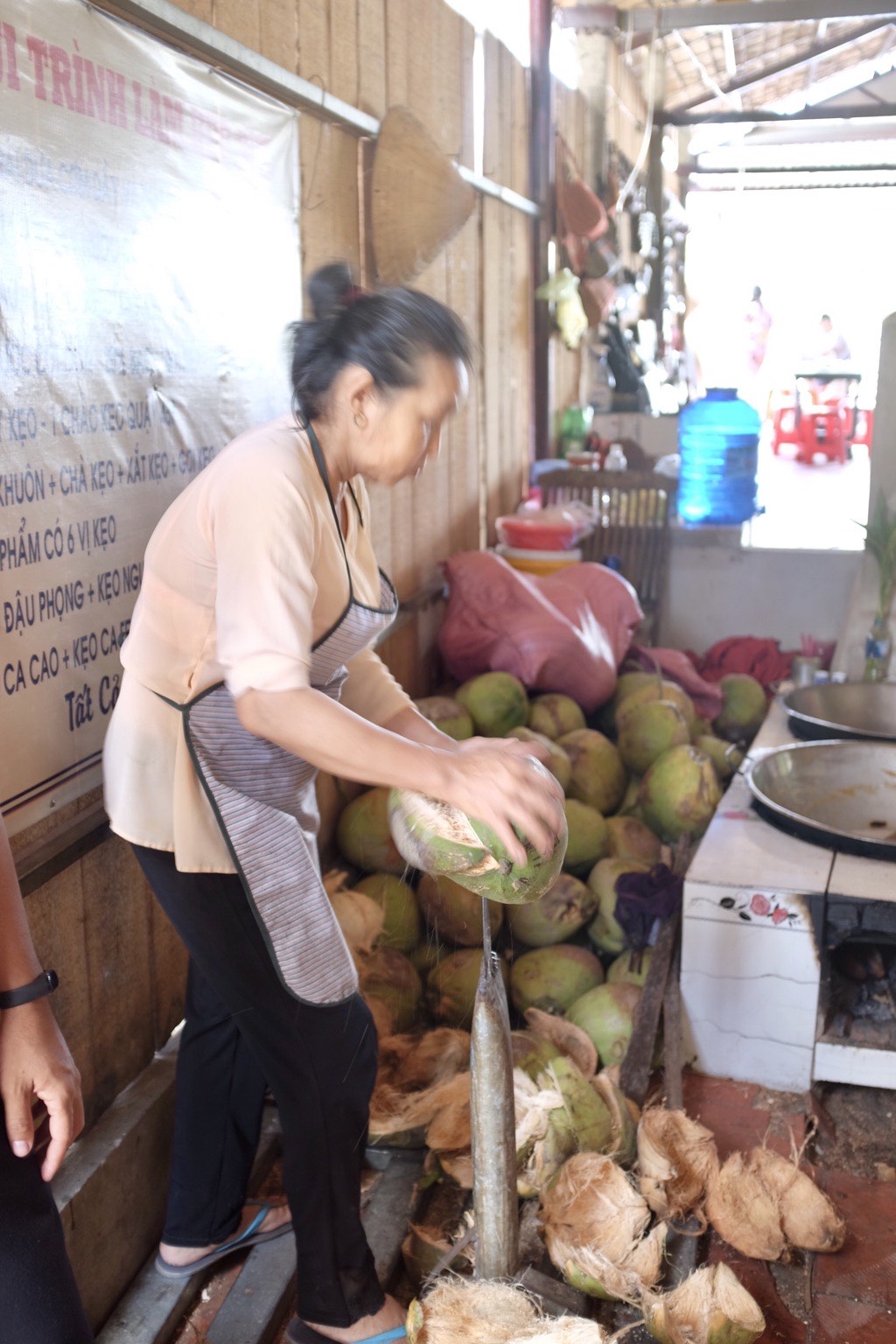 Dehusking Coconut