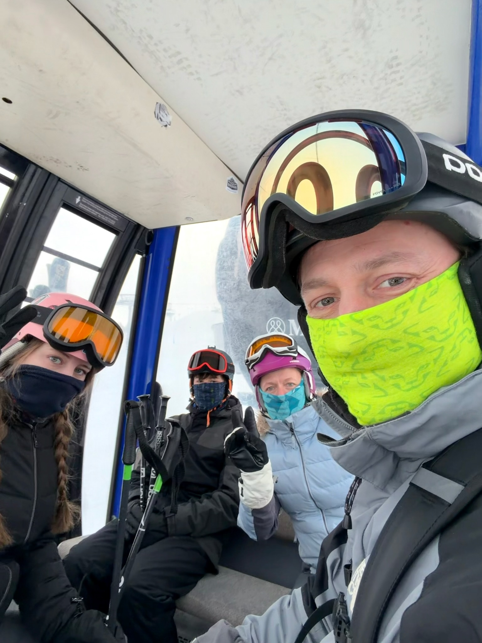Gondola selfie on the way back up — everyone looking suitably cold and happy